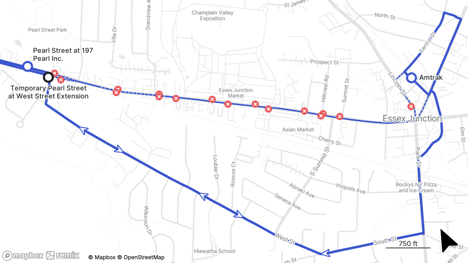 Map showing a temporary transit detour in Essex Junction for the Memorial Day Parade. The detour route travels along West Street, South Street, Park Street, and Central Street, serving stops at Temporary Pearl Street at West Street Extension, Pearl Street at 197 Pearl Inc., and Amtrak. Red X symbols mark closed or impacted stops along Pearl Street and through downtown Essex Junction.